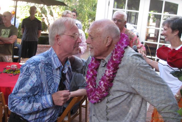 Malcom and Mark about to kiss